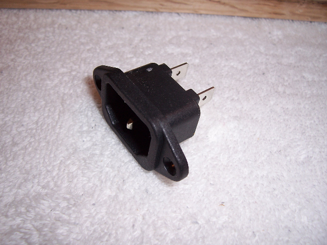 A standard IEC power entry module.